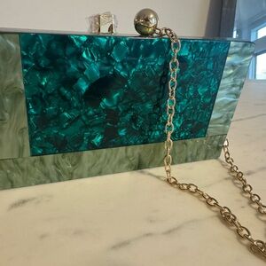 Elegant Green Clutch with Gold Chain